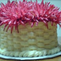 Raspberry Birthday Cake Vanilla cake with raspberry mousse filling, butter cream icing basket weave.