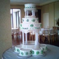 The Crystal Cake tiers are different flavors (lemon pudding, chocolate mocha, french vanilla and stawberry pudding) butter cream icing and royal...