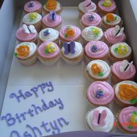 Flower/butterfly Cupcakes These were white cupcakes with buttercream icing (flowers buttercream and butterflies fondant). These were to go with a Little Pony cake...