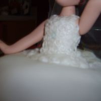 Top I made the top and the made swirlys and painted them with sparkle dust to make it look like lace