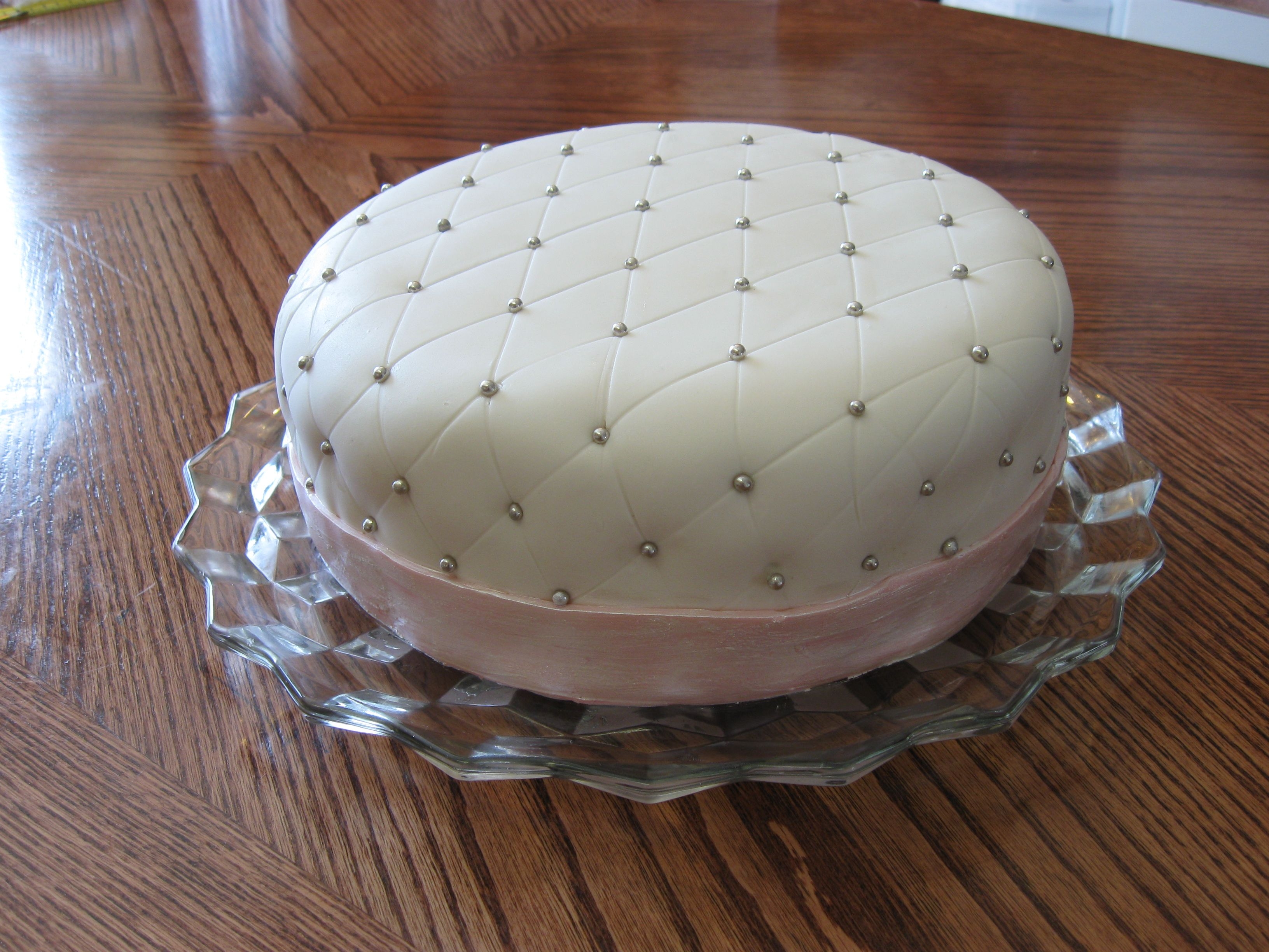 Quilted I made this for a friend's birthday. Covered in mmf. This is the first quilted cake I have done - I'm not sure how to make the...