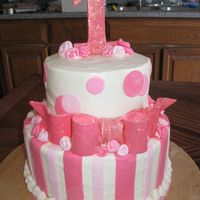 Kylie's 1St Birthday All buttercream with mmf accents. The gumpaste bow and '1' were brushed with disco dust and were very pink and sparkly! They...