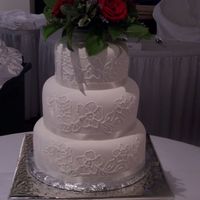 Jolley Wedding I hate that I didn't get etter pics. I really liked this cake. I hope the photographer at the wedding got some nice ones. Any way - it...