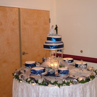 My First Wedding My first wedding for 300 hundred people. Lemon Cake with Butter Cream Icing.The Blue and Silver Flowers was the Color of the Bridesmaids...