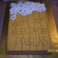 100_0654.jpg Cake for my husband's 31st birthday. He is a HUGE beer drinker, and the guys he works with have been bugging me to bake for them again...