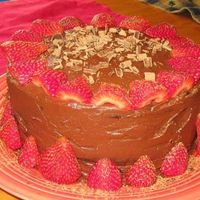 Strawberry Chocolate Cake Chocolate Cake with Whipped Chocolate Genache With fresh Strawberries. This cake smelled like a Chocolate Covered Strawberry