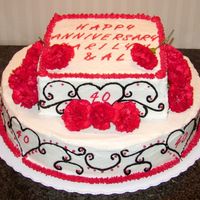 40Th Anniversary I made this cake for a 40th anniversary party. The cake is vanila and it's frosted with buttercream. The red and balck frosting was...