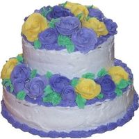 Tiered Flowers Two layer cake made for my sister's birthday decorated with buttercream roses.