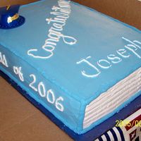 8Th Grade Graduation This is a 1/2 sheet cake covered/filled with buttercream. I used a comb for the pages on the edges. It was gone by the end of the party.