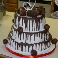 Michelle 12,10,8 covered in fondant and chocolate drizzles. Chocolate covered strawberries. The groom wanted the diamond pattern, so i incorporated...