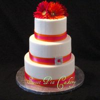 Summer Love 6,8,10 Display Cake. MMF, satin ribbon, silk daisies and handmade off-set crystal buckle.