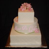 Spring Delight 12, 10,6 display cake. MMF, satin ribbon, silk hydrangeas, pearl border, diamond impression. Inspired by Sugarshack. Thanks for Looking!