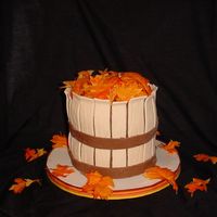 Harvest Basket 8 in pumpkin spice with cream cheese filling. Covered in MMF, silk leaves. Thanks to Merissa for her inspiration and help. TFL!