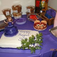 Purple Princess for my sisters 30th birthday...she started to lean a bit (the princess not my sister) it was VERY hot and humid so the frosting started to...