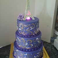 Prom They asked for purple fondant with gold swirls and an eiffle tower! I immediately panicked over the tower, but after starting to make it...