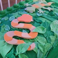 107_1613.jpg Birthday Cake for my ten-year-old brother. Chocolate cake with chocolate icing and mmf leaves.