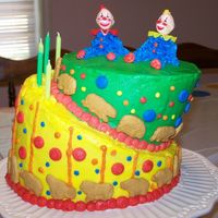 Circus Birthday Cake My sister and I made this for our little sister's fifth birthday today. This is our first topsy turvy cake and I think it's so...