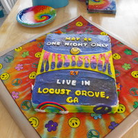 Hippie Poster Cake This cake was made to look like a hippie style poster with cute fondant decorations around it. The cake was a choclate fudge cake with...