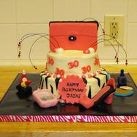 30 And Fabulous This 30 and Fabulous Cake is covered in butter cream icing with fondant decorations.