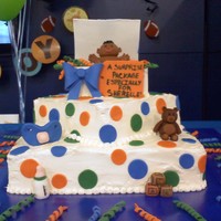 Surprise Package This baby shower cake is covered in butter cream fondant with all hand sculpted fondant decorations. THis was my first attempt at making...