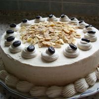 Mocca Cream Cake Coffee-choc-cake sandwiched with Mocca buttercream and iced in Mocca whipped cream.