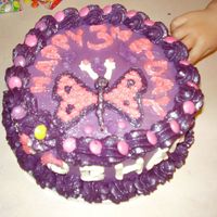 Butterfly Purple Pink Banana Cake ...so this is the cake disaster for my girl's 3rd birthday! All was going great until I dropped the pallette knife on the cake at 2.30...