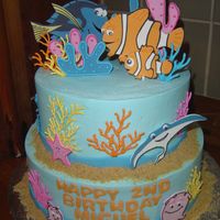 Nemo Cake 6 and 9 inch cake done in buttercream frosting with gumpaste accents. TFL!