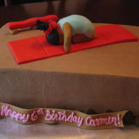 Gymnastics And Tumbling cake for a gymnastics party. chocolate buttercream with fondant accents