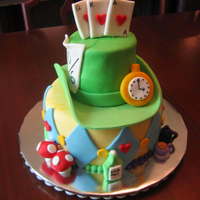 Alice In Wonderland birthday cake for a woman named alice. so much fun! marshmallow fondant over buttercream with gumpaste accents.