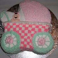 Baby Buggy This is a cake that I made for a baby shower - they want to go with a buggy because it would match the chocolate buggy boxes that I made...
