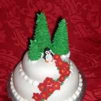 Elegant Fondant Holiday Cake This is a small cake (3 in top, and 5 in bottom) that I made for a display.