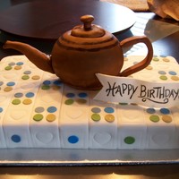 Brown Betty Teapot On Baby Quilt 