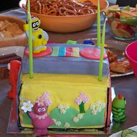 Yo Gabba Gabba Cake 6 layer rainbow cake, buttercream covered with fondant.