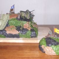 Camoflage Army Cake This was for my cousins little boys first birthday. It was sooo easy to put together because if I messed up you couldn't tell. I was...