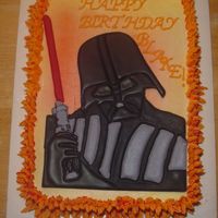 Darth Vader I just delivered this cake. I borrowed an idea that I found on this website - the flame border. Done with orange-colored buttercream with...