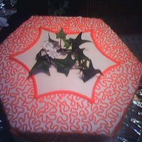 Tier #3 First time I did Cornelli lace. Cake was all hexagon; separated tiers. 4 colors - yellow, yellow-orange, red-orange, and finally red. Iced...