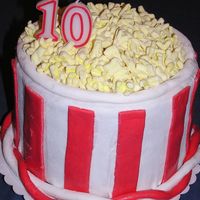 Popcorn Tub I made this for my DD movie night bday party. It was a 3 layer 9" rounds, kalua fudge cake covered with MMF and topped with...