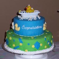 Rub A Dub Ducky This was for my cousin's baby shower. The cakes are 8" and 12", french vanilla layers with buttercream covered in MMF. The...