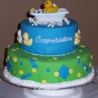 A Ducky Shower For Baby Zachary The cake was french vanilla cream with hazelnut buttercream icing and decorated with marshmallow fondant. Everything is edible except for...