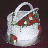 A Basket Of Berries For Mom This cake was created at the request of my mother. The layers were lemon cream and were torted and filled with seedless strawberry jam....