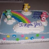 Care Bear Cake This is a 1/4 sheet cake. Flavor was lemon with Lemon Buttercream icing. For a young lady that loved Care Bears from her Grandmother.