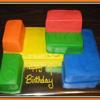Legos I took 2- 8" square cakes and 2-6"square cakes and cut and stacked them. If I had this cake to do over again I would make the...