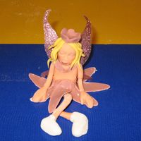 Ice Skating Fairy I still need to finish the details on this peice but this is my first 3-D figure and I'm not sure what else it needs. Any help would...