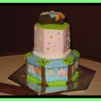 Clothes Line I saw this cake here on CC. Thanks it was a big hit at the Baby Shower. I used a 10" and a 6" hexagon pans and the clothes basket...