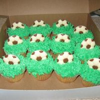 Soccer Cupcakes Made for the kids' soccer team. I filled them with marshmallow fluff and the kids LOVED them! I made the soccer balls out of chocolate...