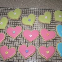 V-Day Cookies Quick cookies for my son's Pre-K Valentine's party. NFSC with Antonias royal icing. Little conversation heart in the middle.