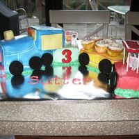 Sutter's Train I HATE this cake. It took me forever to make and it still looks like ***not good***. Oh well....at least the birthday boy is only 3 and a...