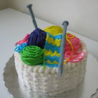 Knitting Cake all buttercream except for fondant needles. I loved the ace of cakes knitting cake - I think it would have looked better with fondant.......