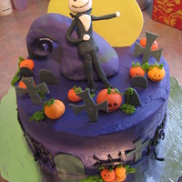 Nightmare Before Christmas Nightmare before Christmas cake - buttercream cake, fondant pumpkins and headstones. The curvy purple thing is made from Rice Krispie cake...