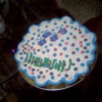Flower Garden Cupcake cake done for family dinner. 30 Cupcakes make up this cake for one of my families many family gatherings, Sad to say this cake did...